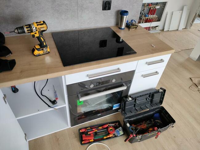 Elektryk - podłączanie kuchenki indukcyjnej GWARANCJA