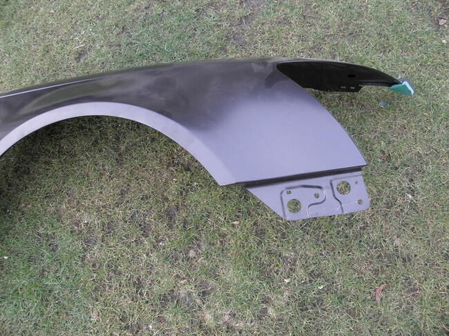 Audi A6 C6 nowy błotnik przód prawa str.