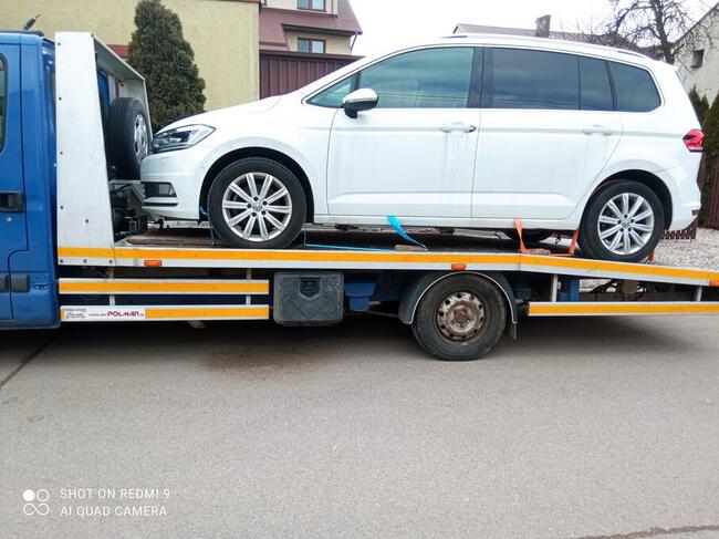 Auto holowanie Pomoc drogowa Laweta