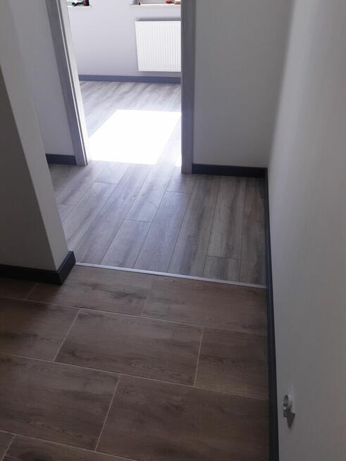 Zabudowa poddasza / Elewacje / Prace wykończeniowe