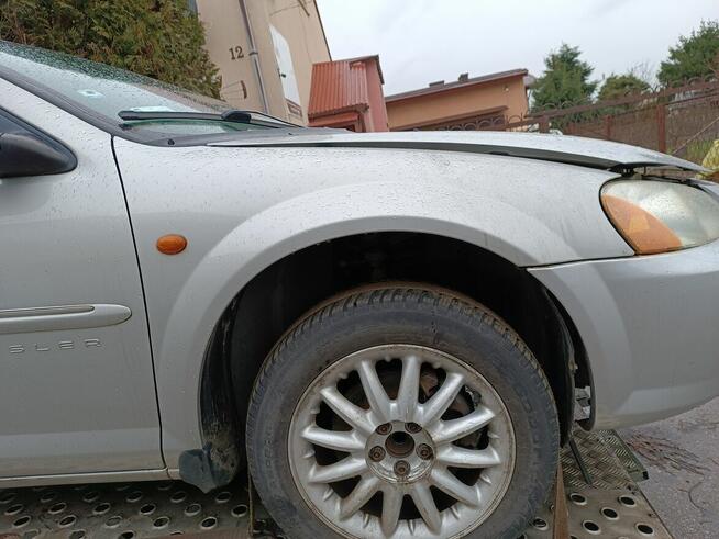 Chrysler Sebring 2 II sedan BŁOTNIK lewy prawy przód PS2