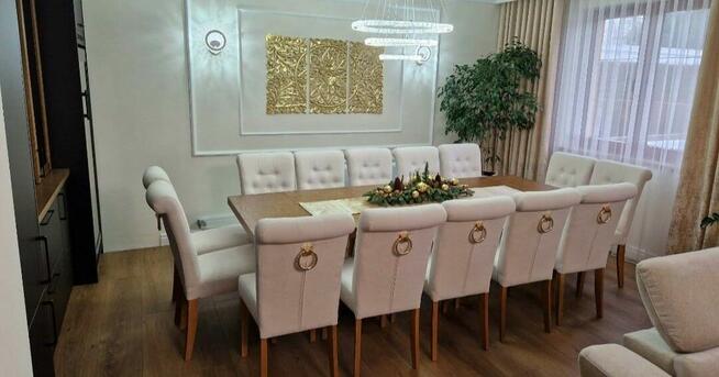 Krzesło tapicerowane pikowane z kołatką szare Producent Nowe