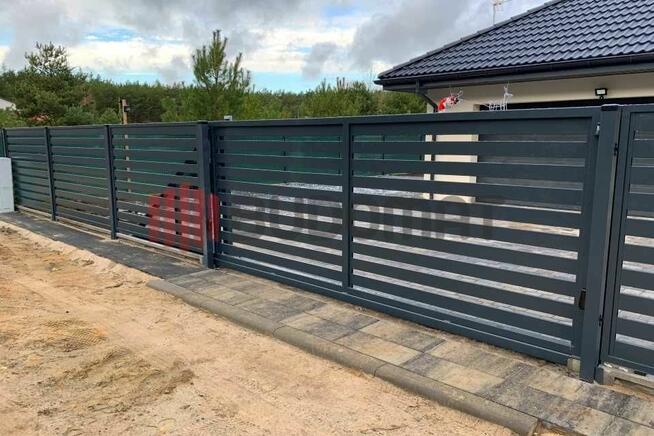 Brama przesuwna samonośna wjazdowa panelowa wózki rolki