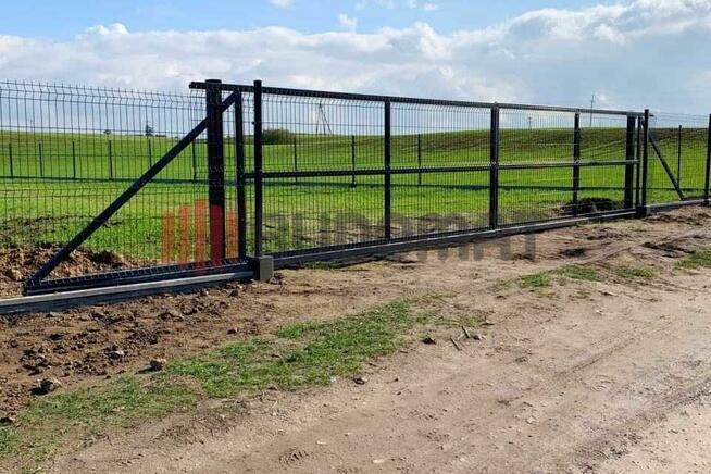 Brama przesuwna samonośna wjazdowa panelowa wózki rolki