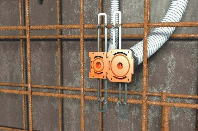 Puszki, przepusty do instalacji w betonie lanym / wibrowanym