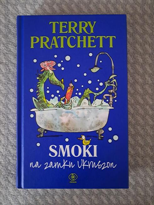 Książka „Smoki na zamku Ukruszon” T. Pratchett