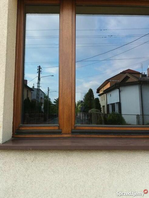 Malowanie renowacja drewnianych drzwi i okien