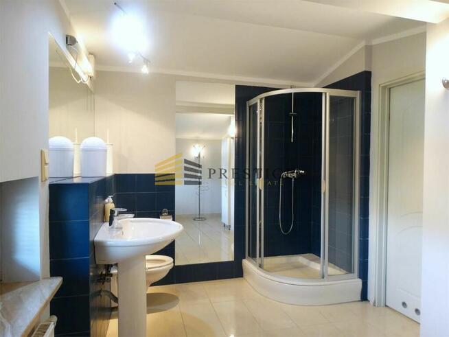 Elegancki dom z ogrodem i sauną w prestiżowej loka