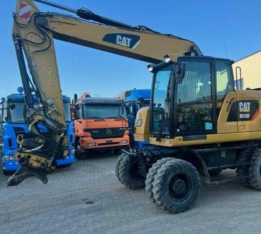 Koparka kołowa Cat Caterpillar M 318 F