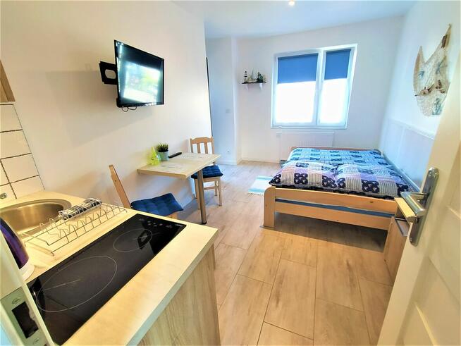 Pokoje z łazienkami aneksem kuchennym.