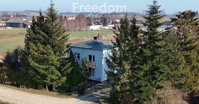 Dom z dodatkowymi działkami