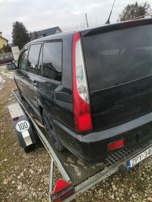 Mitsubishi lancer 2.0 dohc benzyynna