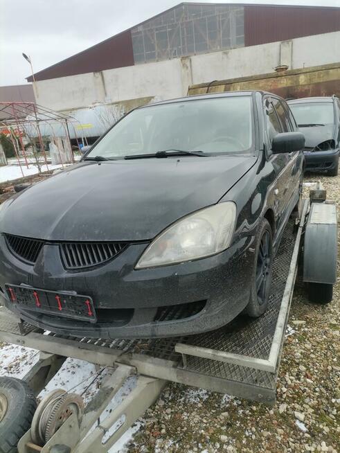Mitsubishi lancer 2.0 dohc benzyynna