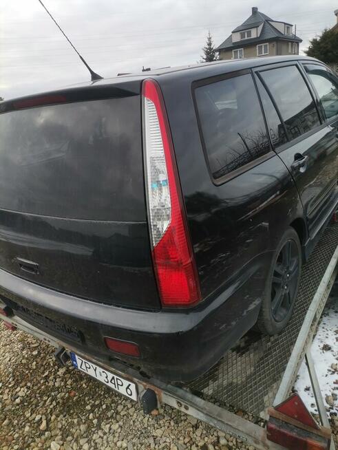 Mitsubishi lancer 2.0 dohc benzyynna