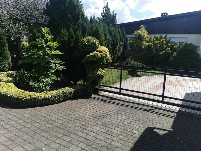 Nietuzinkowa posiadłość dwa domy , duży ogród , taras