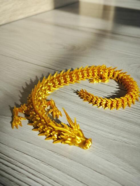 SMOK złoty ruchomy smok