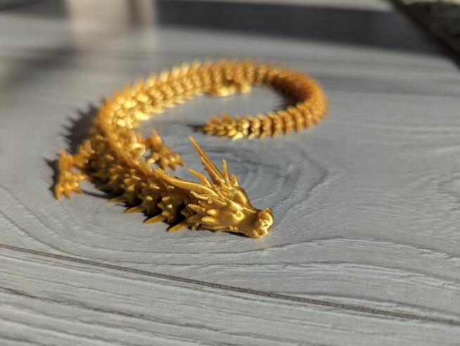 SMOK złoty ruchomy smok