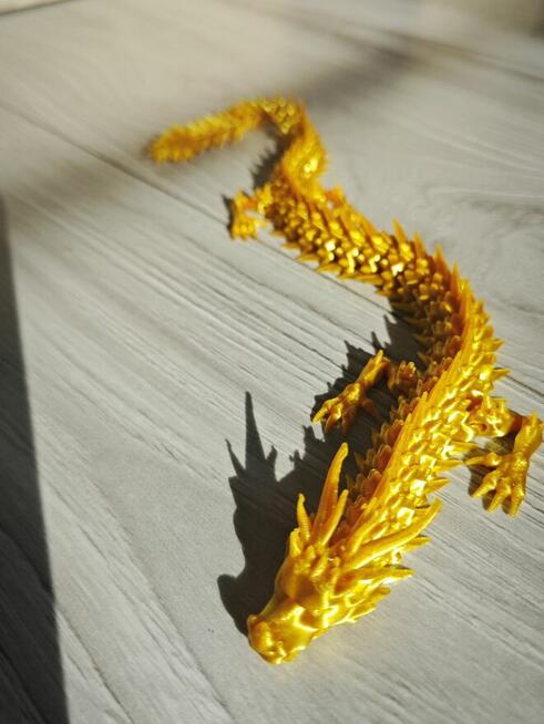 SMOK złoty ruchomy smok