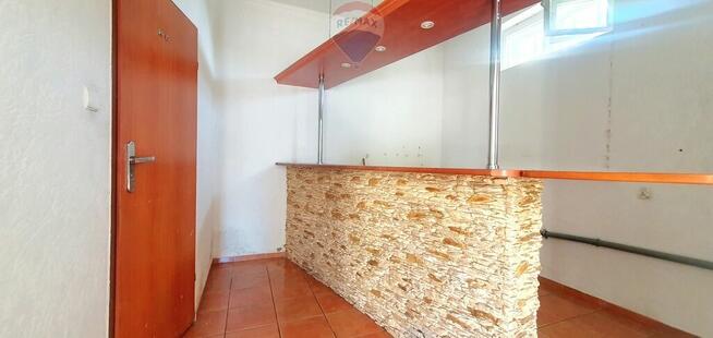 Duży dom jednorodzinny z częścią usługową