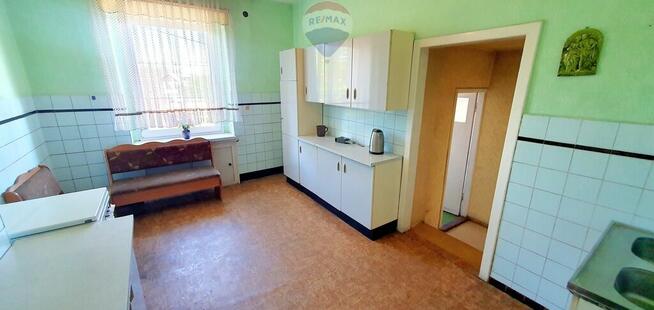 Duży dom jednorodzinny z częścią usługową