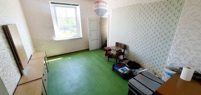 Duży dom jednorodzinny z częścią usługową