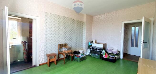 Duży dom jednorodzinny z częścią usługową