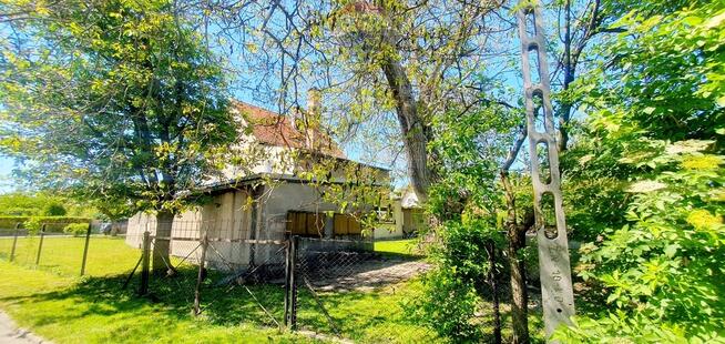 Duży dom jednorodzinny z częścią usługową