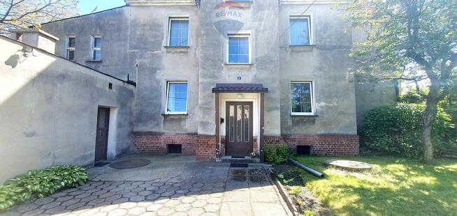 Budynek mieszkalny z częścią usługową