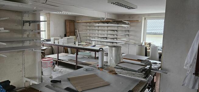 Udział 1/4 w nieruchomości stanowiącej działkę zabudowaną