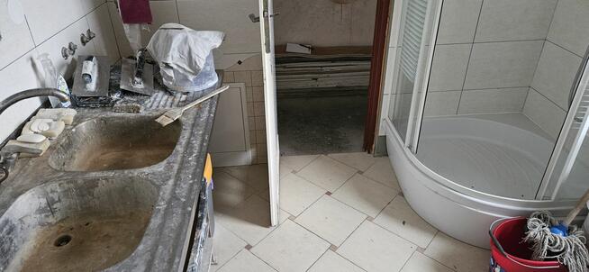 Udział 1/4 w nieruchomości stanowiącej działkę zabudowaną