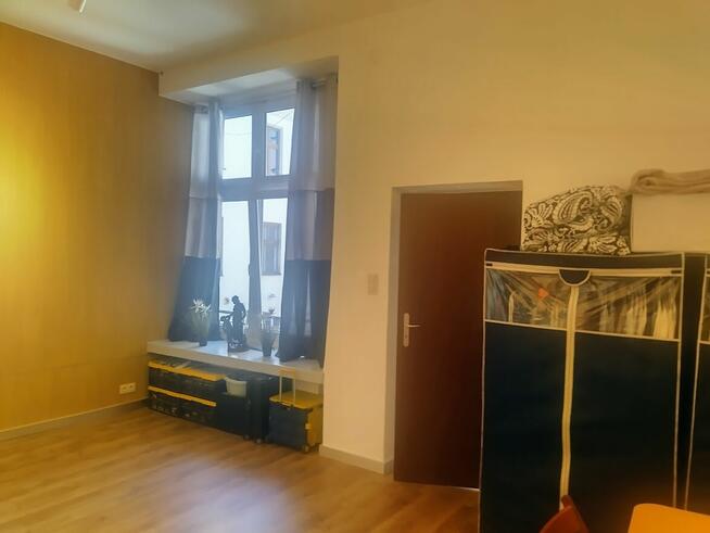 Udział W kamienicy w okolicy Wawelu