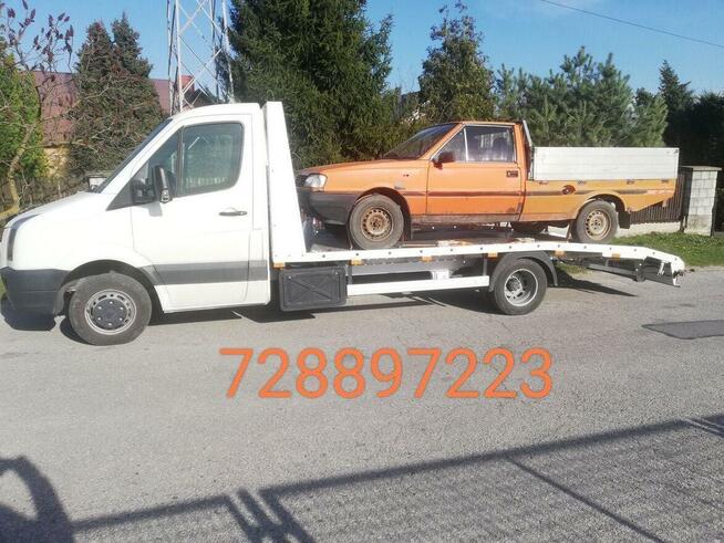 Pomoc drogowa holowanie laweta transport