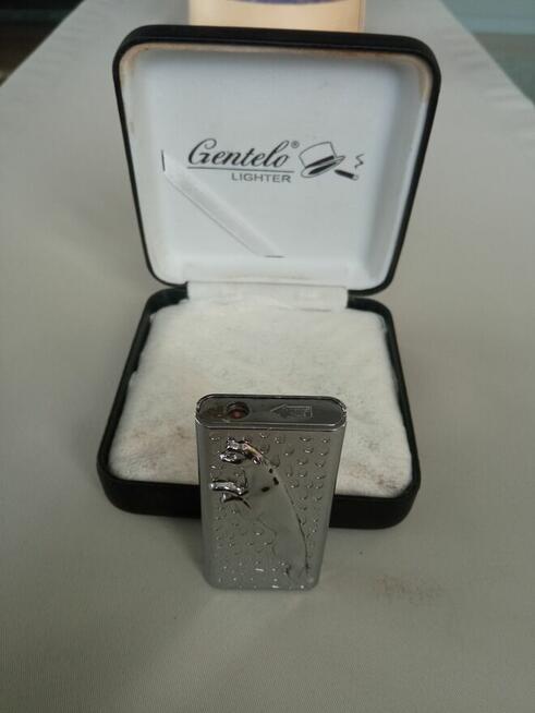 Zapalniczka Żarowa Srebrna w pudełku orginał cena 100 zł pol