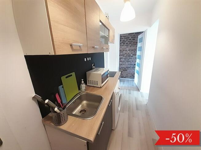 Jasny pokój z Internetem, Niedurnego 2