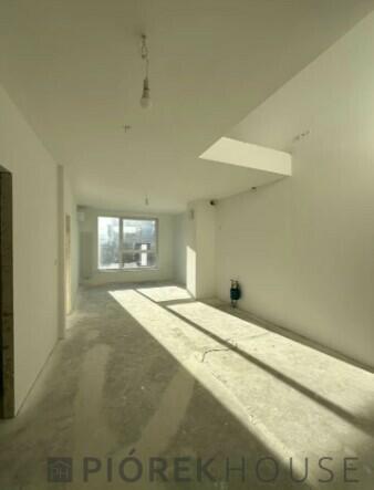 Dwupoziomowe mieszkanie na Woli