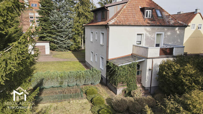 Bezczynszowe mieszkanie z ogrodem i dwoma garażami
