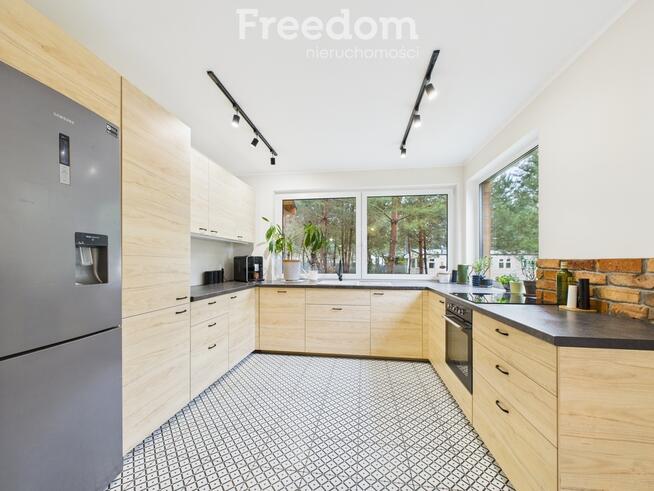 Dom parterowy w otulinie lasu