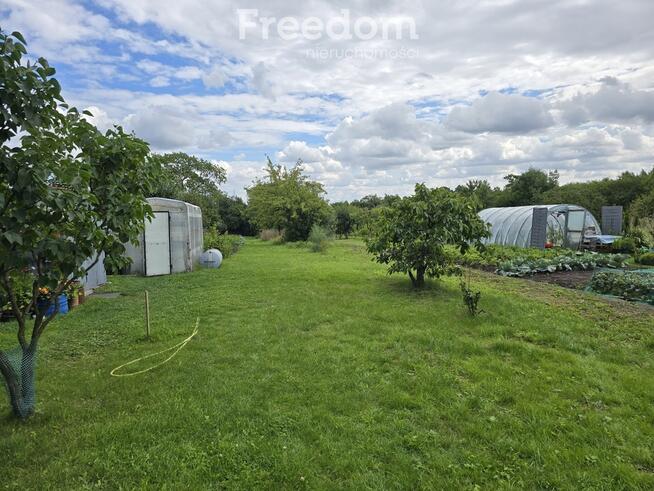 Przytulne „M” z dużą działką obok bloku !