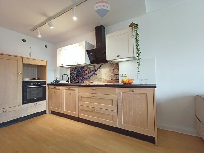 Nowoczesne dwupoziomowe mieszkanie w Centrum