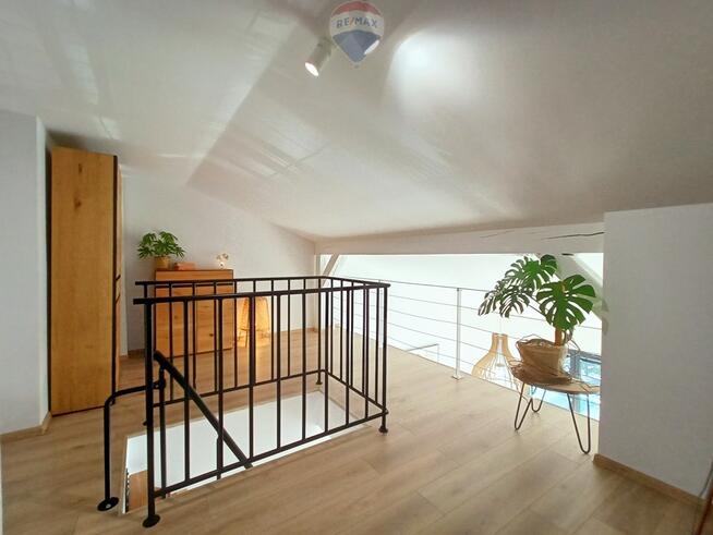 Nowoczesne dwupoziomowe mieszkanie w Centrum