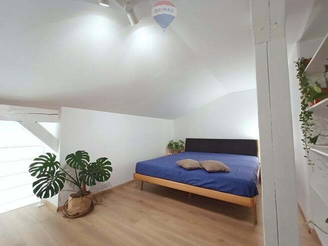 Nowoczesne dwupoziomowe mieszkanie w Centrum