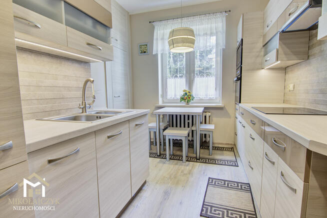 Bezczynszowe mieszkanie z ogrodem i dwoma garażami