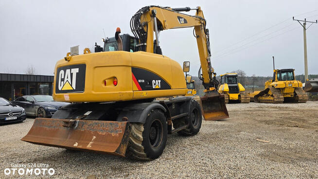 Caterpillar m313d