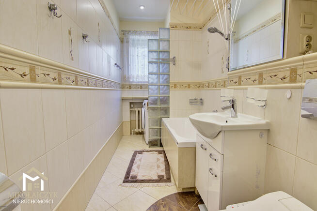 Bezczynszowe mieszkanie z ogrodem i dwoma garażami