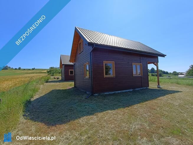 Działka z 2 domkami całorocznymi