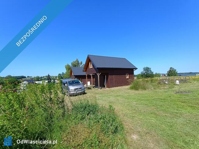Działka z 2 domkami całorocznymi