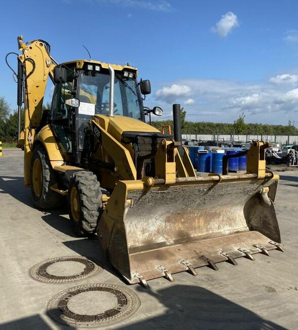 Koparko ladowarka Caterpillar