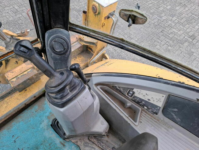 Koparko ladowarka Caterpillar