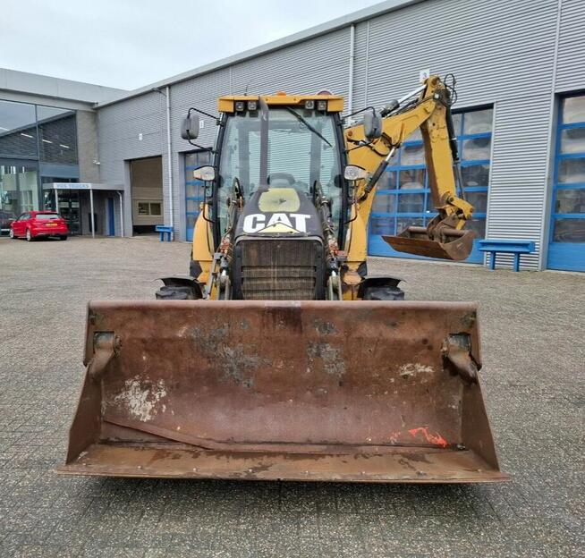 Koparko ladowarka Caterpillar