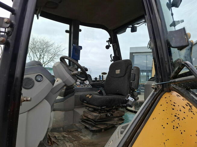 Koparko ladowarka Caterpillar